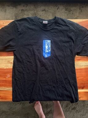 Supreme Black T-Shirt with Blue Chest Graphic